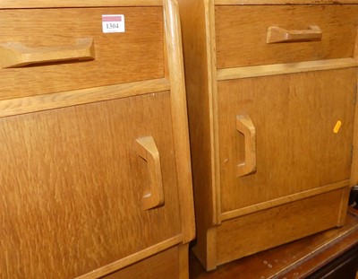 Lot 1304 - A pair of 1960s G-Plan light oak bedside...