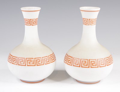 Lot 4100 - A pair of Victorian milk glass vases, each of...