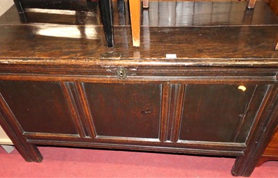 Lot 1332 - An 18th century joined oak three panelled...