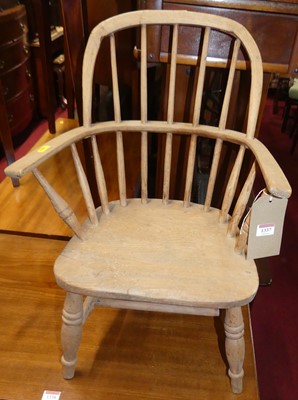 Lot 1337 - A child's elm stickback Windsor chair, w.42cm