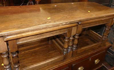 Lot 1347 - A contemporary moulded oak nest of three...