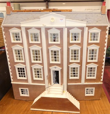 Lot 1379 - A four-storey dolls house in the Georgian...