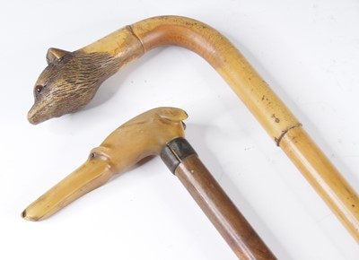 Lot 4192 - An early 20th century bamboo walking cane, the...