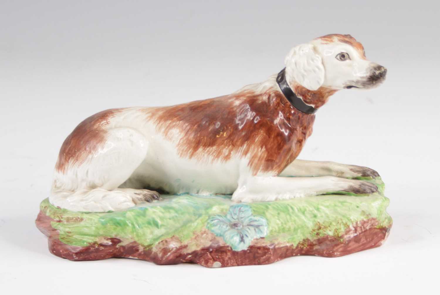 Lot 4054 - A Neale & Co pearlware model of a dog, early...
