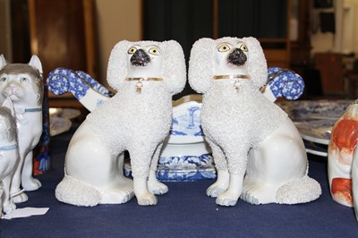 Lot 4056 - A pair of Victorian Staffordshire models of...