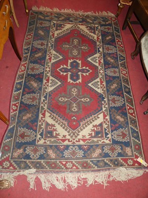 Lot 1434 - A Persian woollen blue ground Shiraz rug, with...