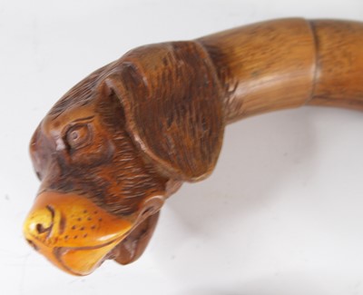 Lot 4197 - An early 20th century bamboo walking cane, the...