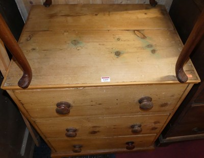 Lot 1459 - A rustic pine squarefront chest of three long...