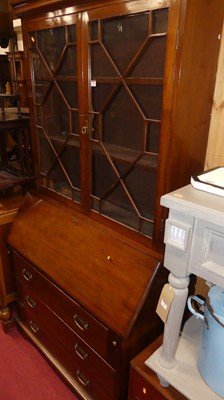 Lot 1484 - An early 20th century mahogany bureau bookcase,...