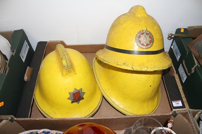 Lot 786 - Three vintage yellow fireman's helmets to...