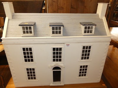 Lot 1494 - A painted three-storey dolls house in the...