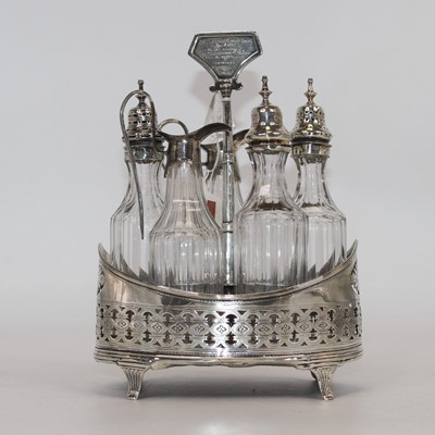 Lot 317 - A George III white metal five bottle cruet...