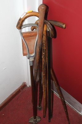 Lot 747 - A collection of walking sticks to include a...