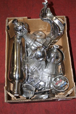 Lot 757 - A box of chrome car mascots and chrome fittings