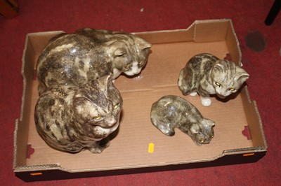 Lot 766 - Four Winstanley pottery figures of cats each...