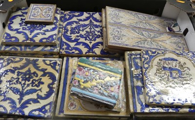 Lot 679 - A box of tiles to include Persian examples