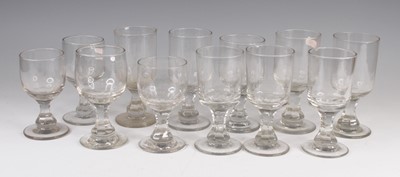 Lot 4091 - A matched set of eight Georgian glass rummers,...