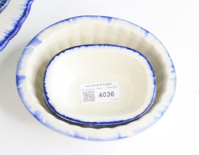 Lot 4036 - A matched pearlware dinner service, early 19th...