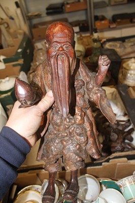 Lot 708 - A Chinese root wood carving of an elderley man