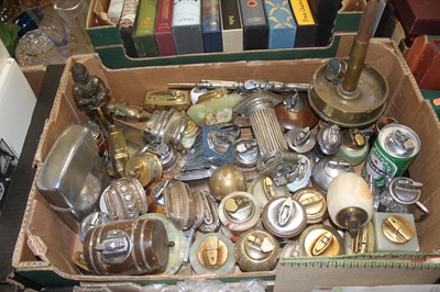 Lot 798 - A collection of table lighters to include...