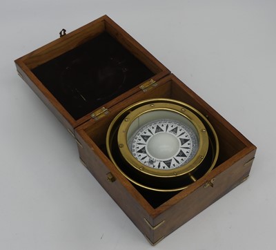 Lot 571 - A reproduction brass ship's compass, cased