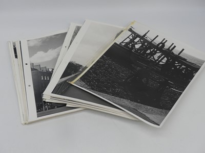 Lot 581 - A collection of black and white printed...