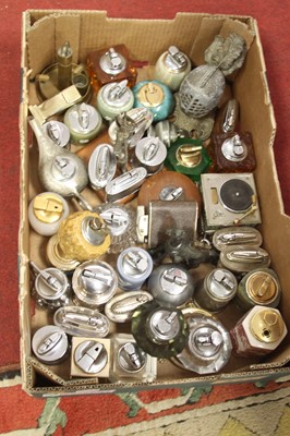 Lot 813 - A box of table lighters to include novelty...