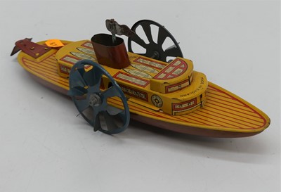 Lot 628 - A tinplate clockwork paddle-steamer, boxed