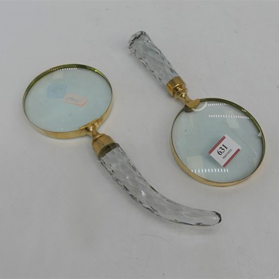 Lot 631 - Two magnifying glasses with facet cut glass...