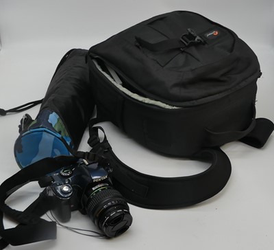 Lot 639 - A Pentax digital camera with lenses, cased;...