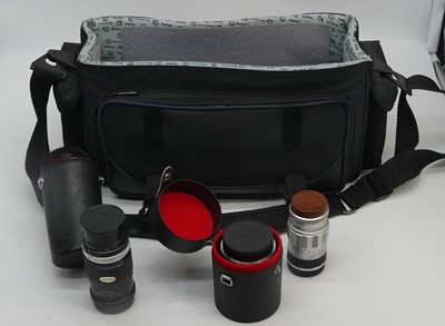 Lot 663 - A Hama bag containing various lenses to...