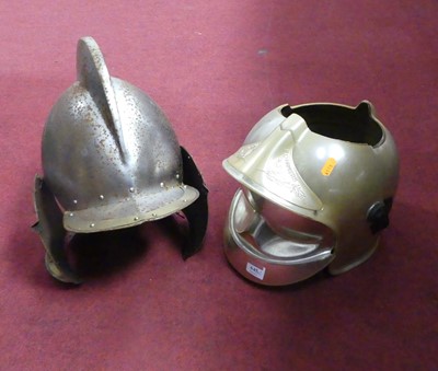 Lot 645 - A reproduction metal knights helmet, together...