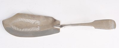 Lot 4124 - A George IV silver fish slice, in the fiddle...