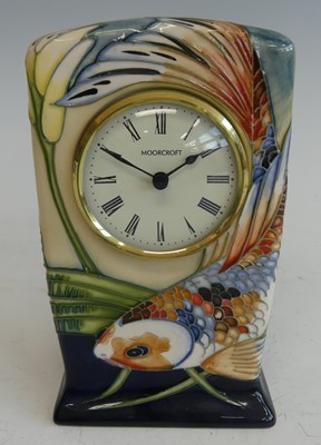 Lot 83 - A contemporary Moorcroft pottery mantel clock...