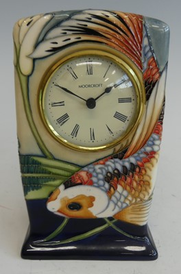 Lot 84 - A contemporary Moorcroft pottery mantel clock...