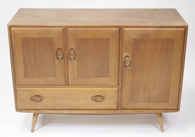 Lot 459 - An Ercol light elm Windsor compact...