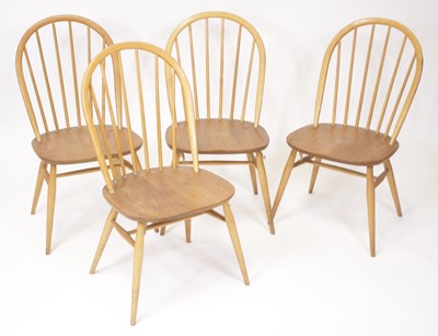 Lot 456 - A set of four Ercol model 370 light elm...