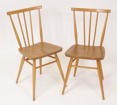 Lot 449 - A pair of Ercol model 391 light elm stickback...