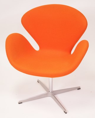 Lot 527 - After Arne Jacobsen - a Swan chair, orange...