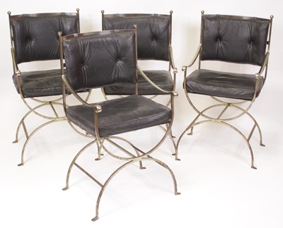 Lot 519 - A set of four 1960s steel X-framed elbow...