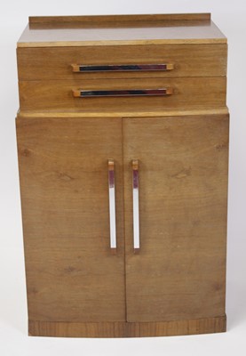 Lot 436 - Attributed to Heal's - an Art Deco walnut side...