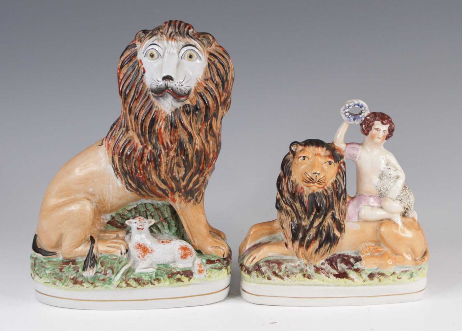 Lot 4061 - A Staffordshire model of a lion and a lamb,...