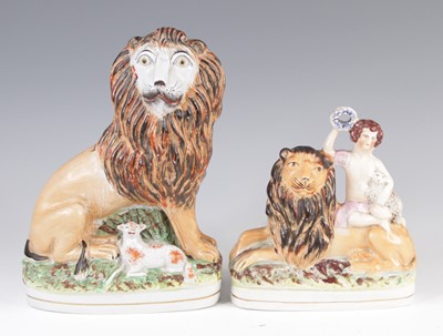 Lot 4061 - A Staffordshire model of a lion and a lamb,...