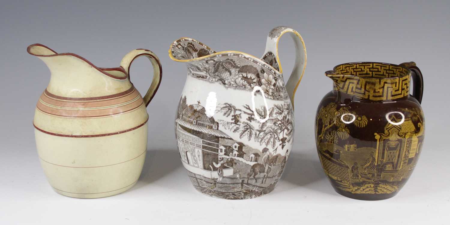 Lot 4024 - Two 19th century jugs, together with a...