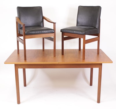 Lot 484 - A 1960s teak dining suite, comprising;...