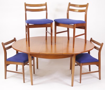 Lot 478 - A 1970s teak dining suite, comprising; D-end...