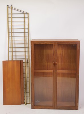 Lot 477 - A 1970s Ladderax teak modular wall unit,...