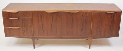 Lot 473 - A 1960s teak long sideboard by A.H. McIntosh &...