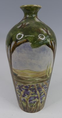 Lot 31 - A Cobridge Stoneware bottle vase in the Caley...