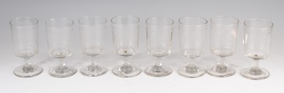 Lot 4092 - A set of eight Georgian glass rummers, the...